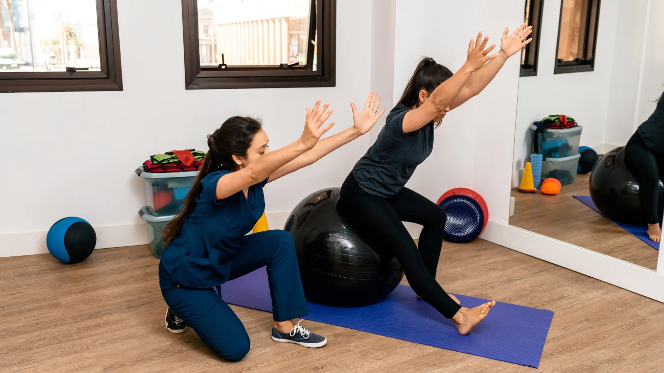 woman recieving postpartum physiotherapy from best doc physiotherapist