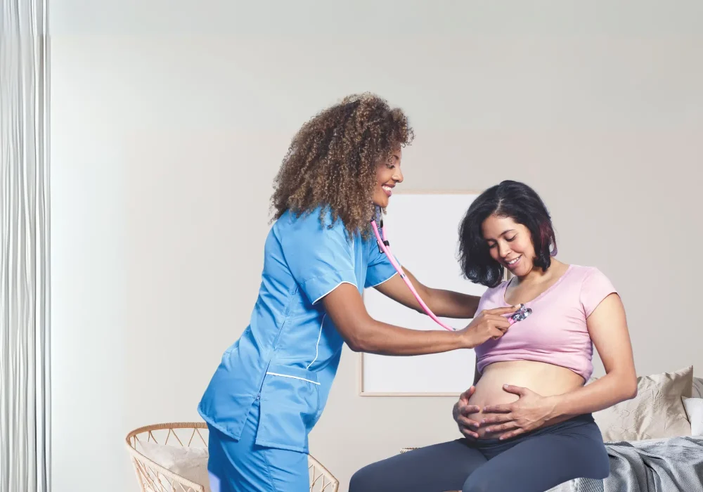 A Female nurse taking care of a Pregnant Woman