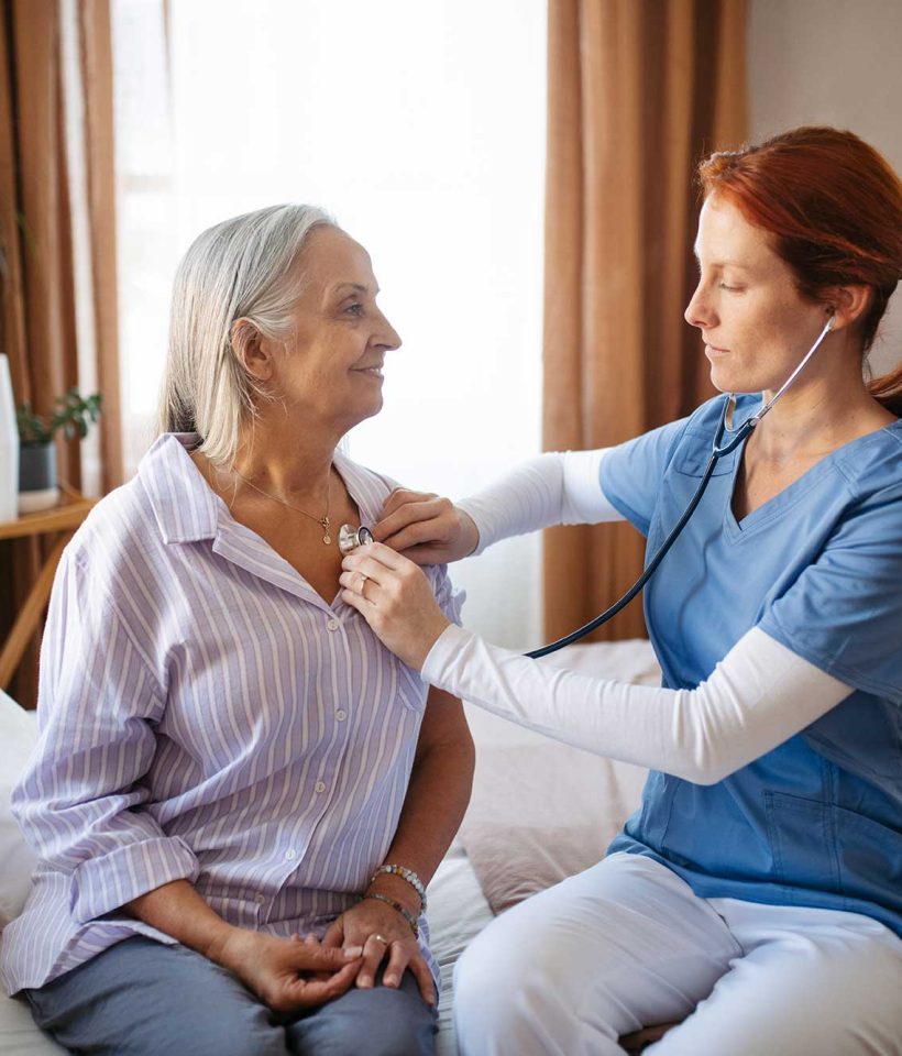 nurse-examining-senior-patient-with-stethoscope-at-2023-11-27-04-49-31-utc.jpg